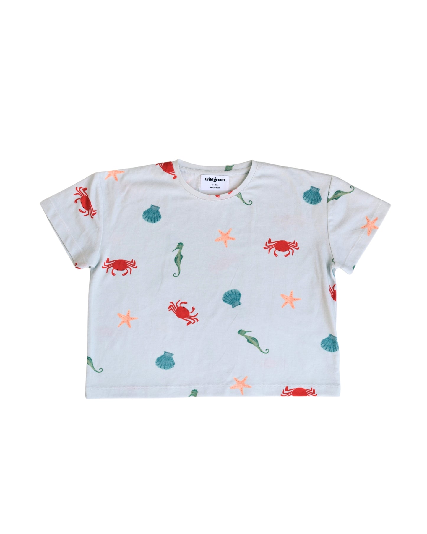 Wildgreen’s Marine T-shirt, a gender-neutral kids' tee made from 100% GOTS-certified organic cotton. Featuring an ocean-inspired print, this sustainable and eco-friendly piece is perfect for conscious families. #OrganicKidswear #SustainableFashion #EthicalClothing