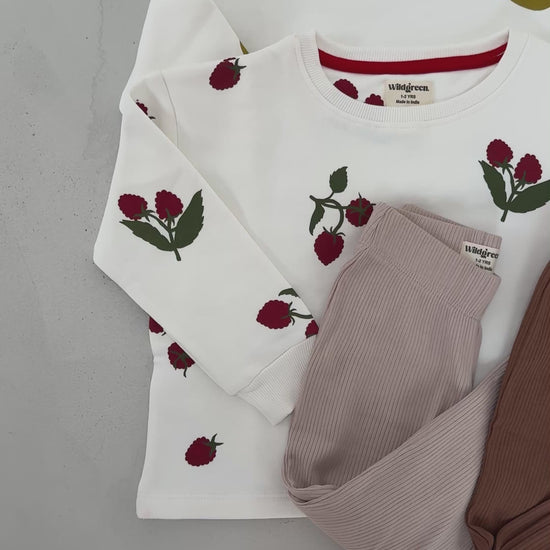 Video showcasing Wildgreen’s Orchard kidswear capsule collection. Organic cotton oversized sweaters and ribbed leggings in earthy, unisex tones and patterns