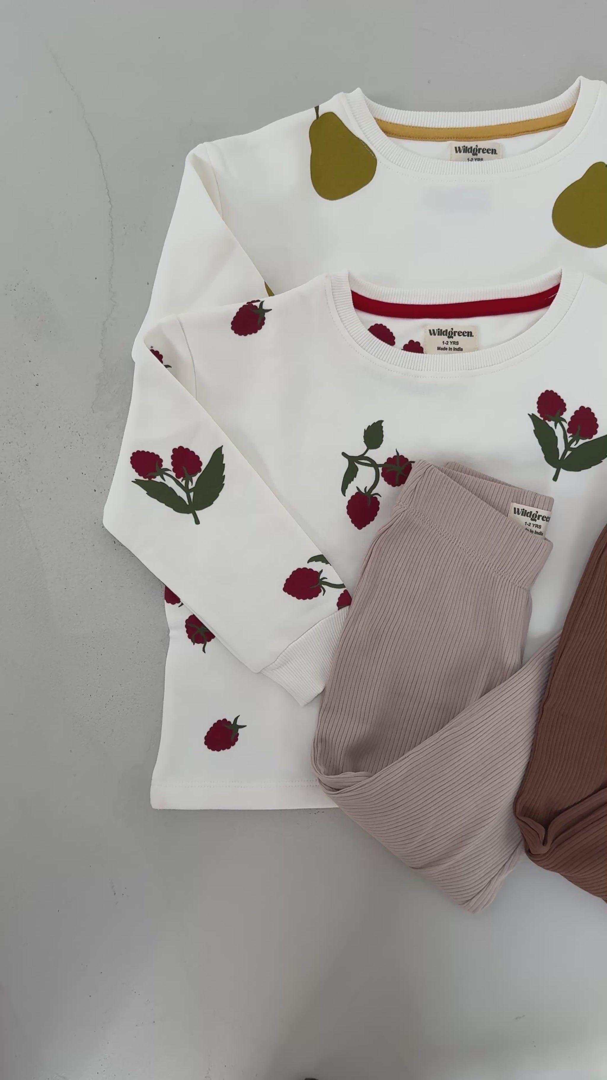 Video showcasing Wildgreen’s Orchard kidswear capsule collection. Organic cotton oversized sweaters and ribbed leggings in earthy, unisex tones and patterns